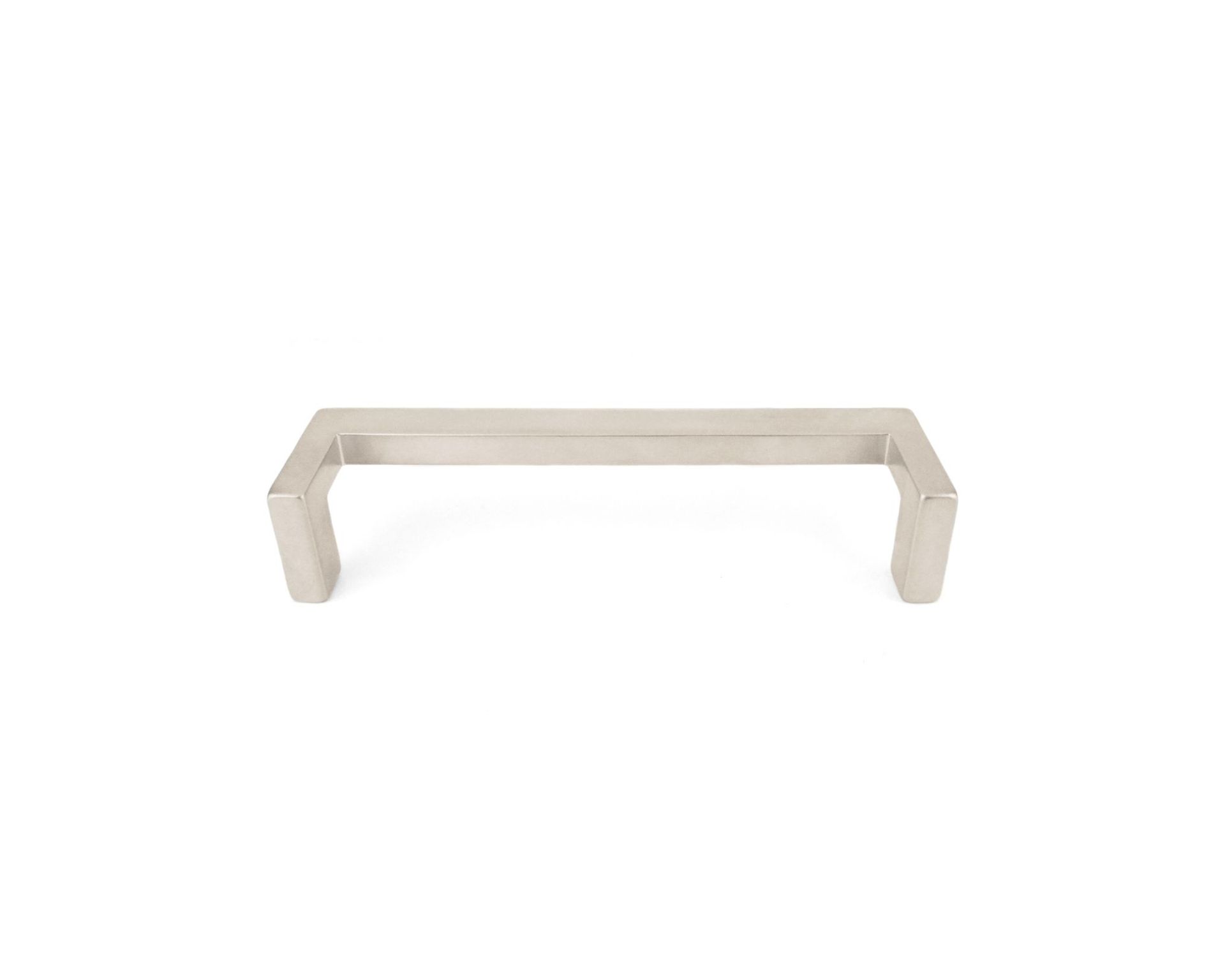 A stainless steel cabinet handle on a white background.