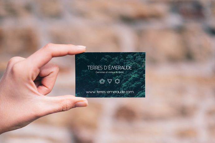 Hand Holding Blue Business Card — Printing Services in Coffs Harbour, NSW