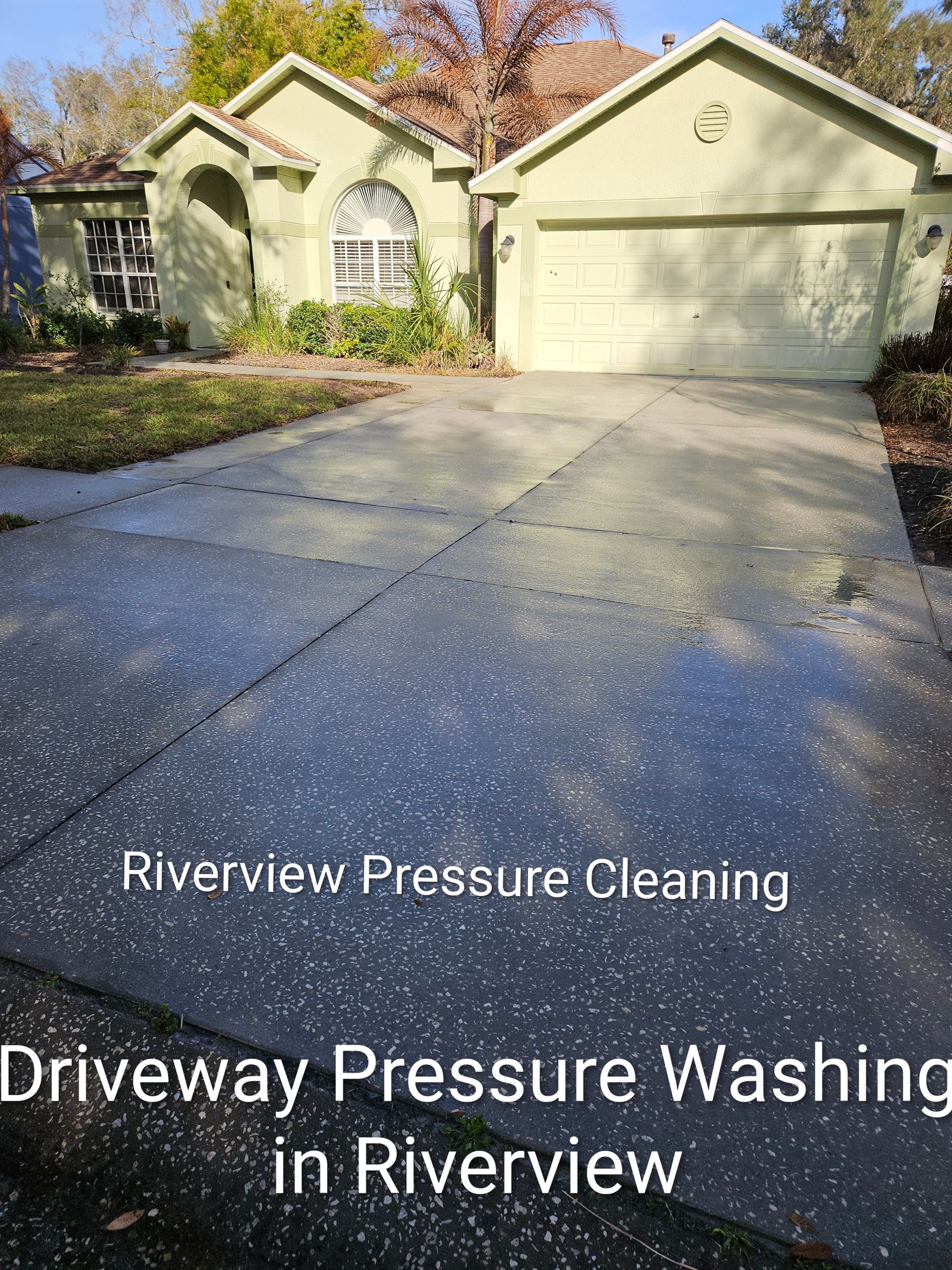 Driveway pressure washing service in Riverview, showing a home and cleaned concrete driveway