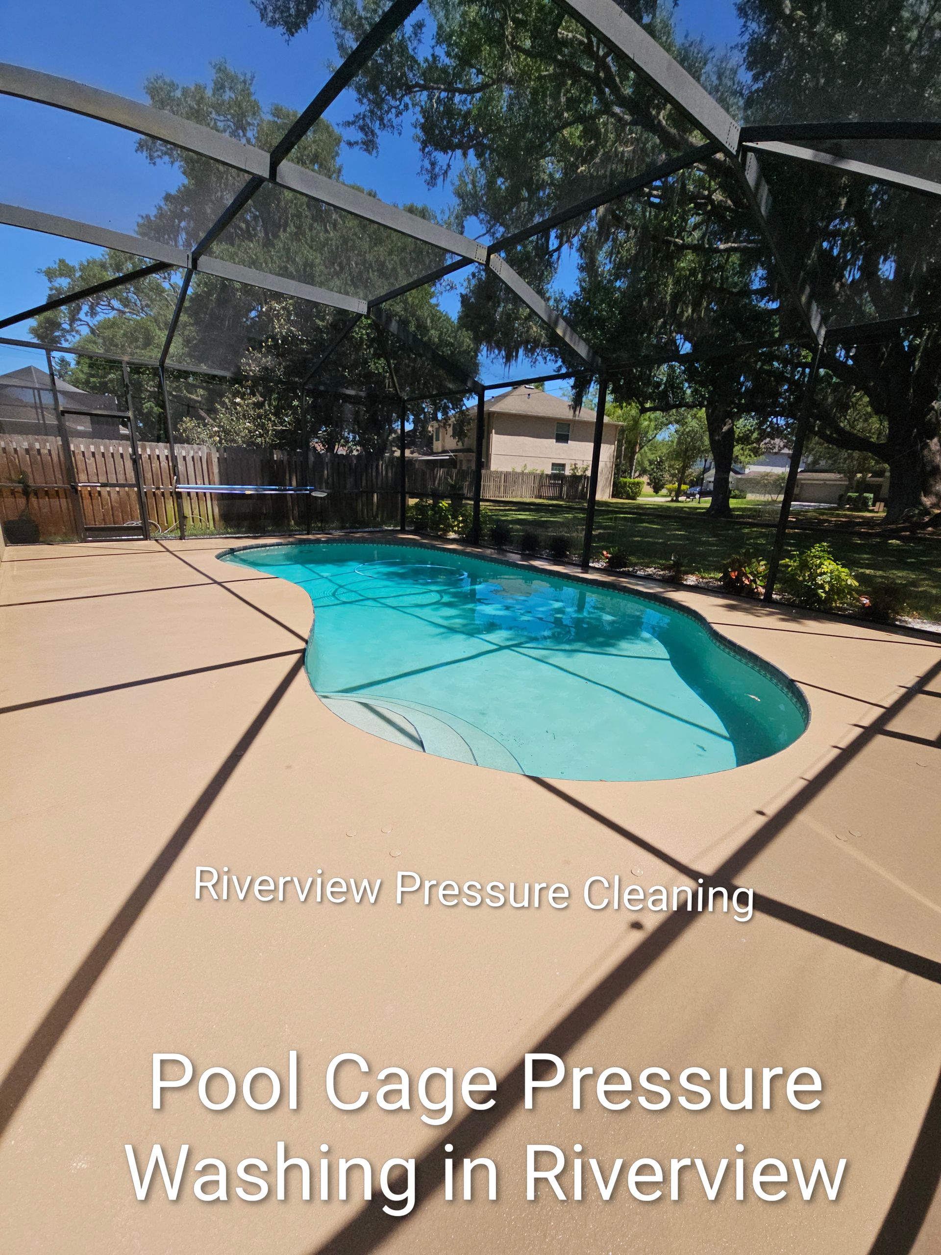 Pool cage pressure washing on a sunny backyard patio with a blue pool in Riverview.
