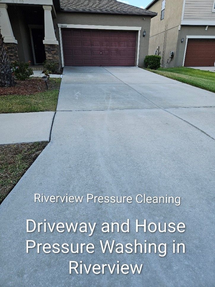 Dirty driveway and house exterior with algae and mildew buildup in Riverview FL