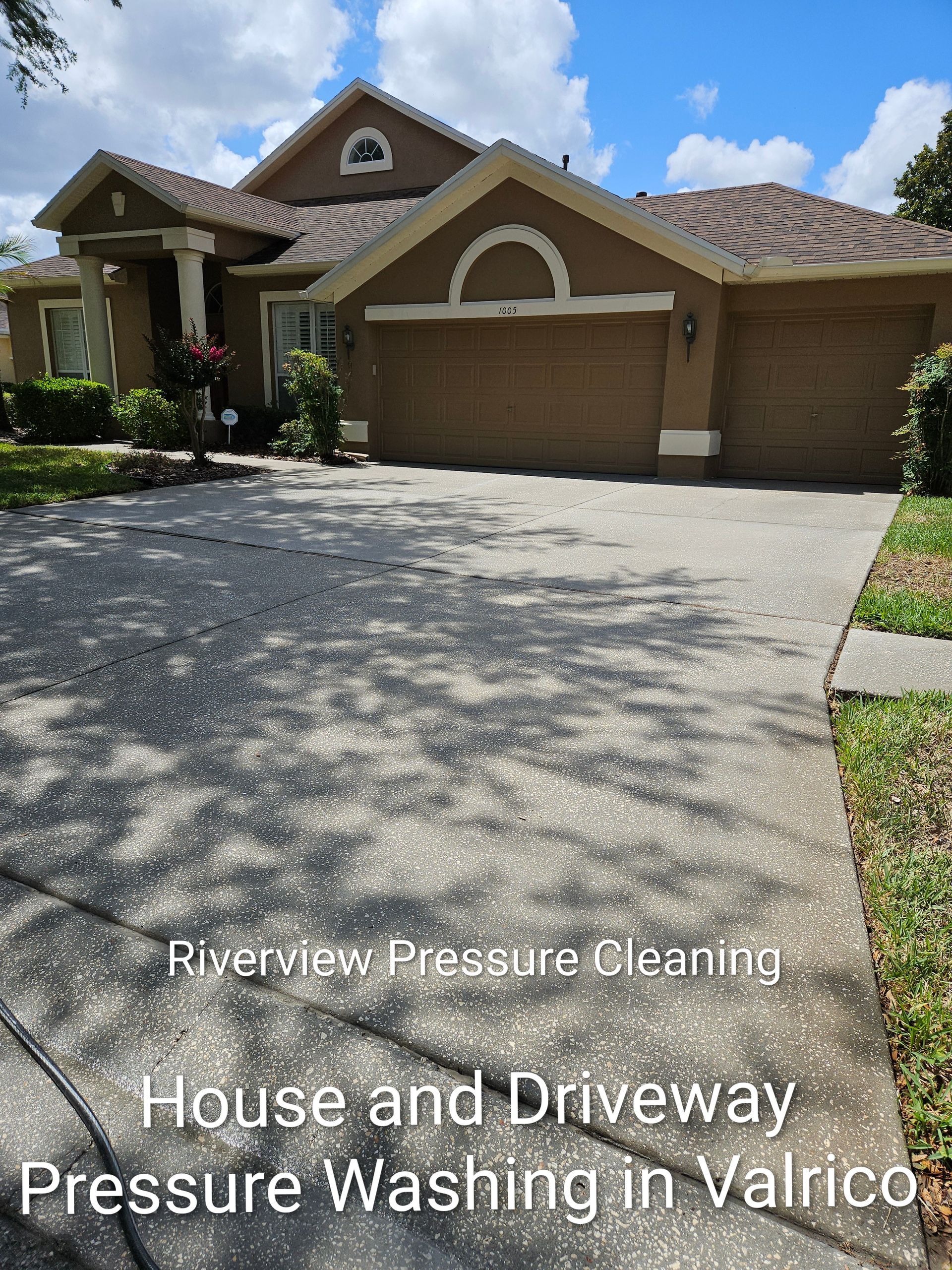 Clean house exterior and bright driveway after pressure washing in Valrico Florida
