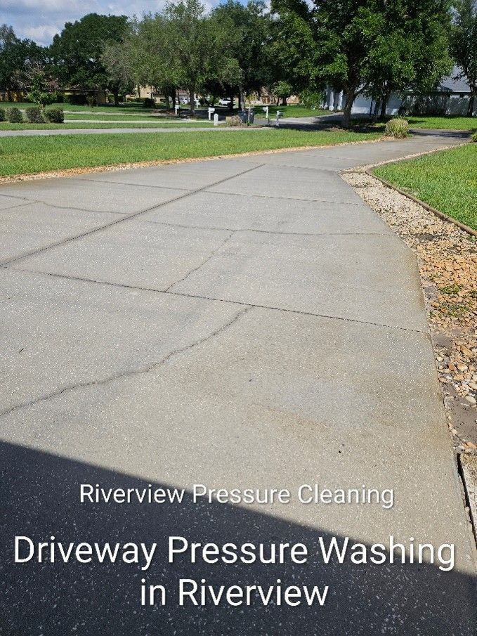 Clean concrete driveway and walkway after professional pressure washing in Creek Side Riverview