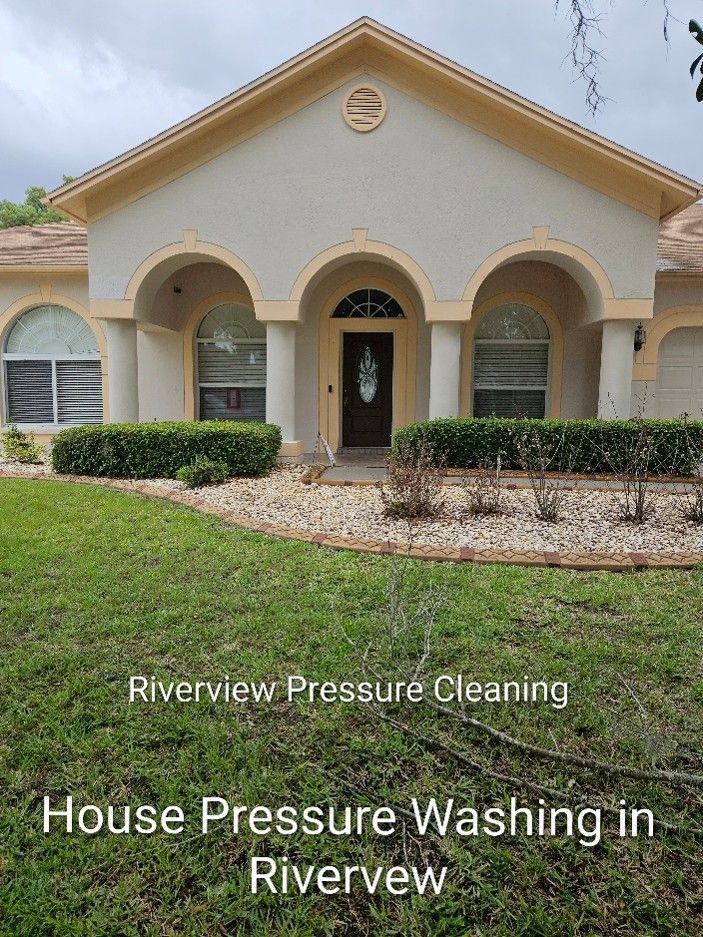 Freshly cleaned house in Riverview after pressure washing exterior walls, fascia, windows, and front porch