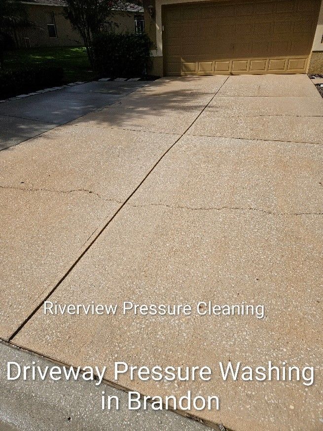 Clean driveway sidewalks and walkway after professional driveway pressure washing in Woodberry Brandon FL