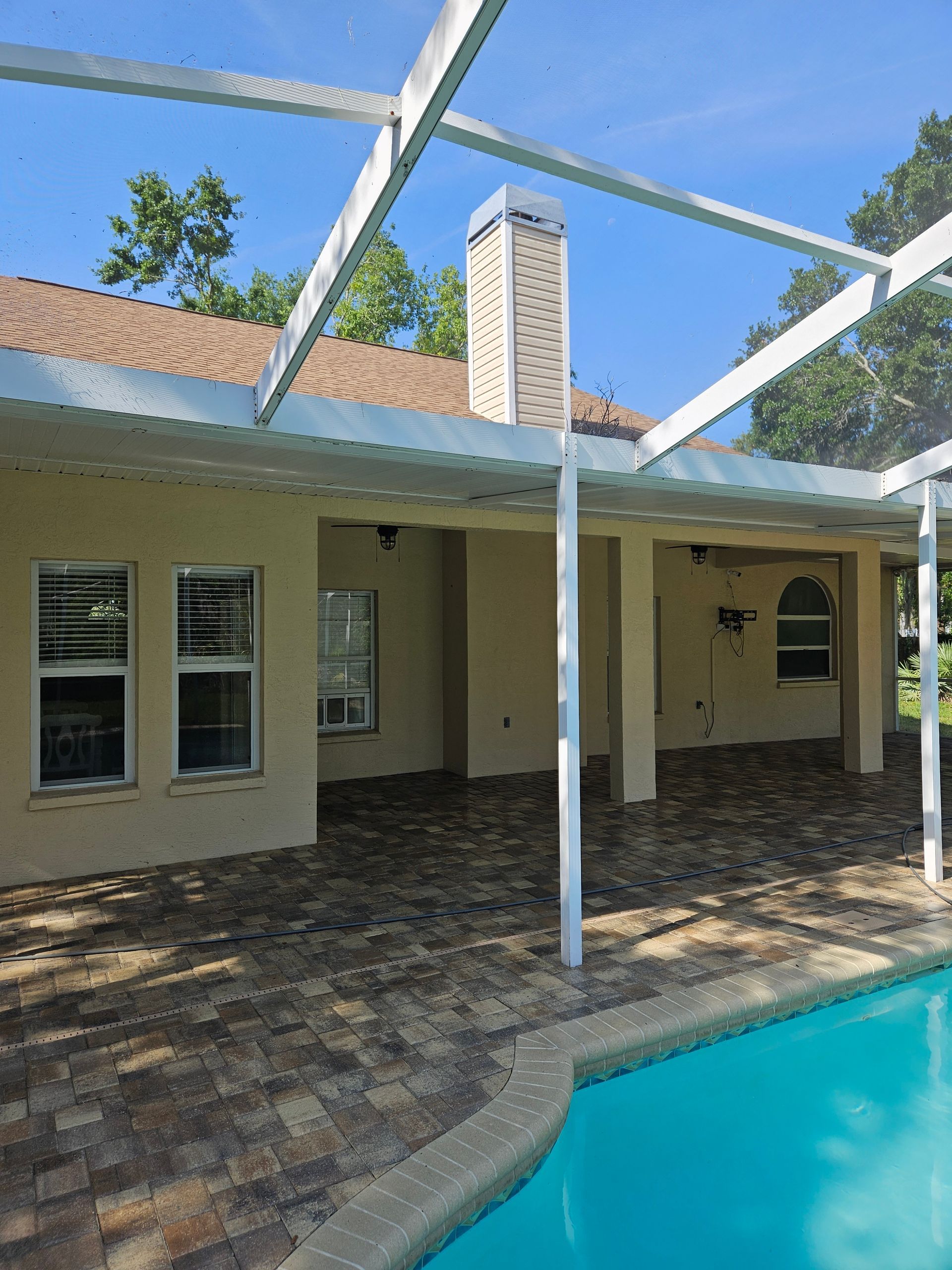 Clean a pool cage before listing your home for sale.