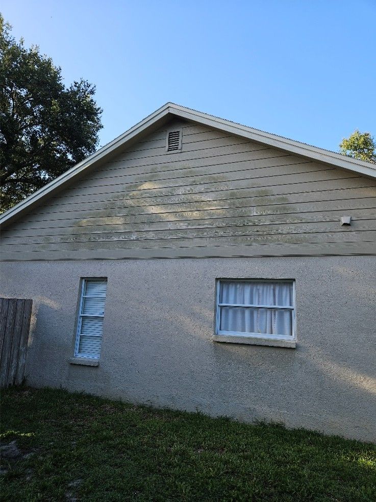 House exterior before and after cleaning showing algae removal