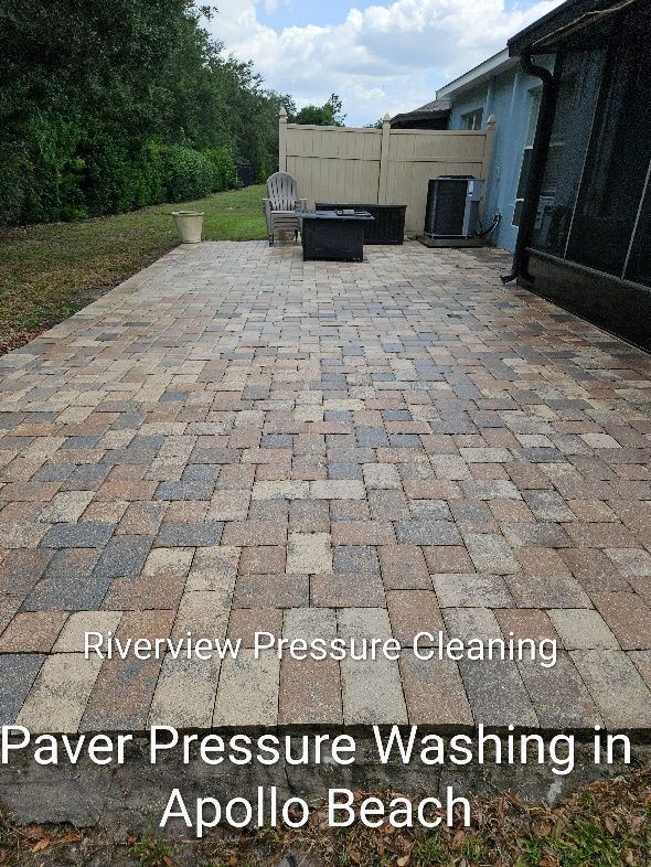 Dirty driveway and paver patio with algae and mildew buildup in Apollo Beach FL