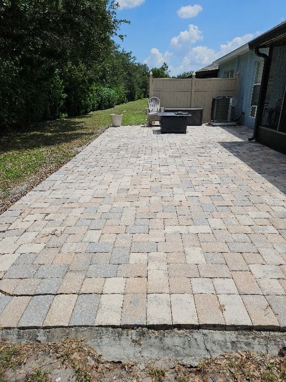 Clean driveway, walkway, sidewalks, and paver patio after pressure washing in Apollo Beach FL