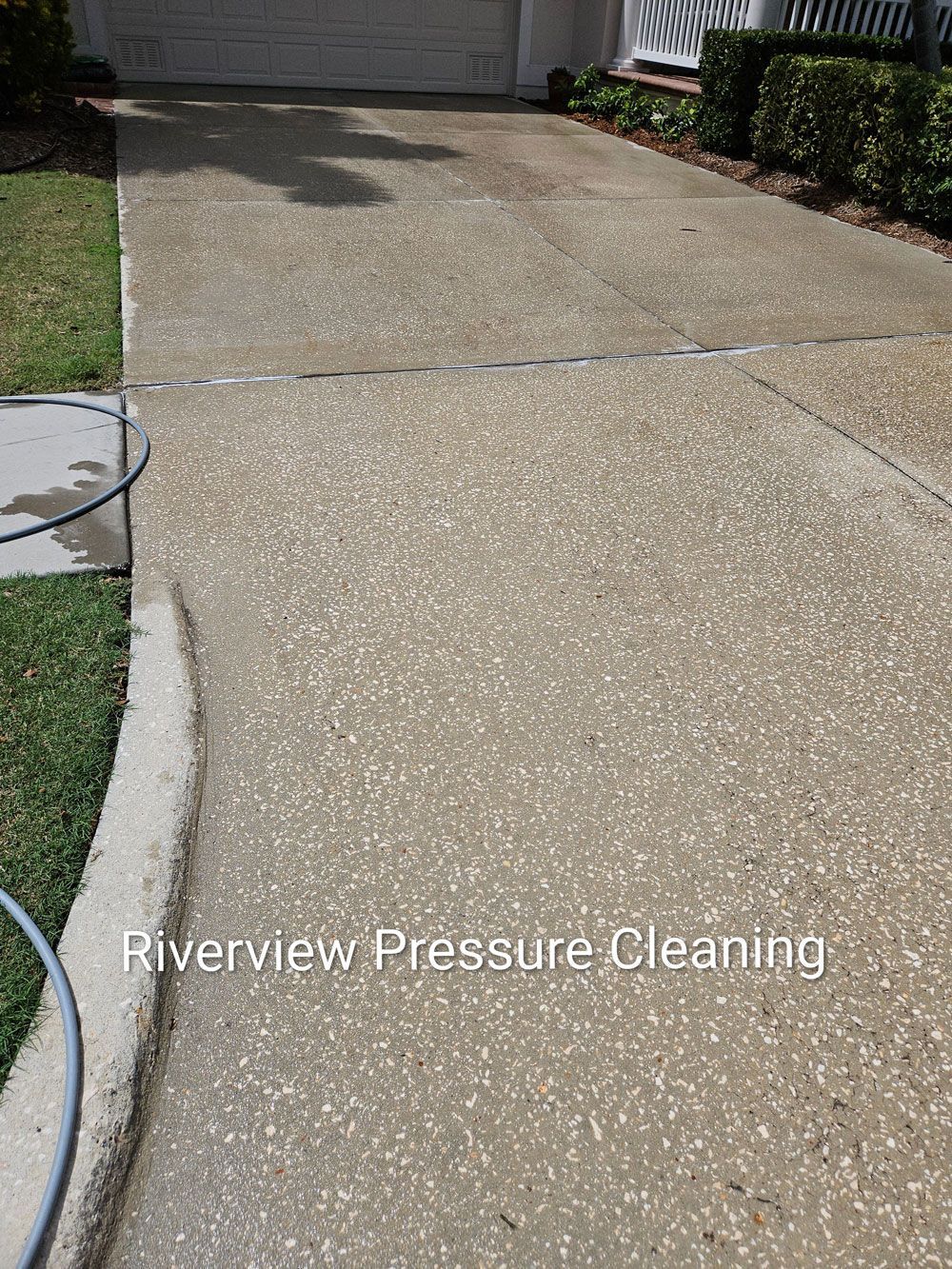 Apollo Beach driveway and sidewalks with algae and dirt buildup