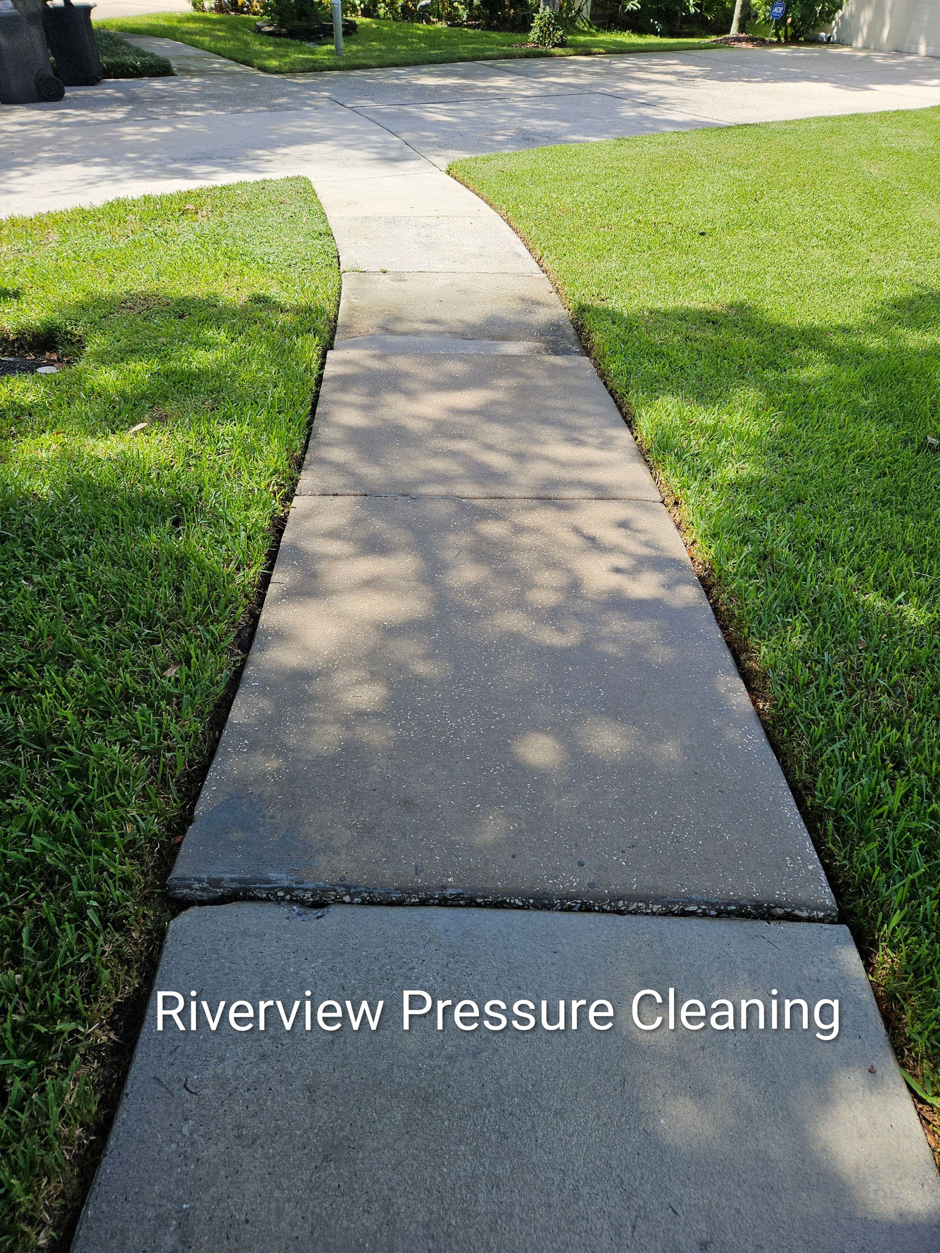 Clean driveway and sidewalks after pressure washing in Woodberry Brandon FL