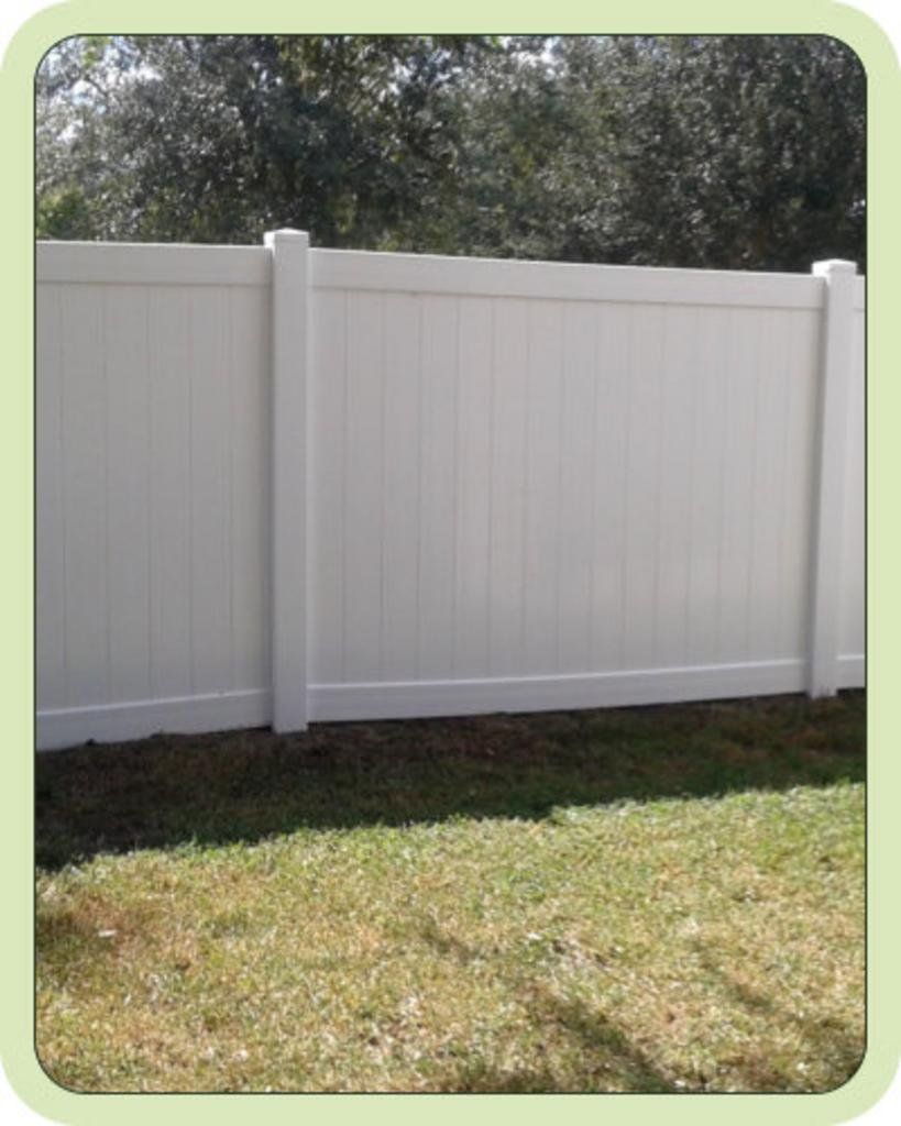 Clean PVC vinyl white fence after pressure washing