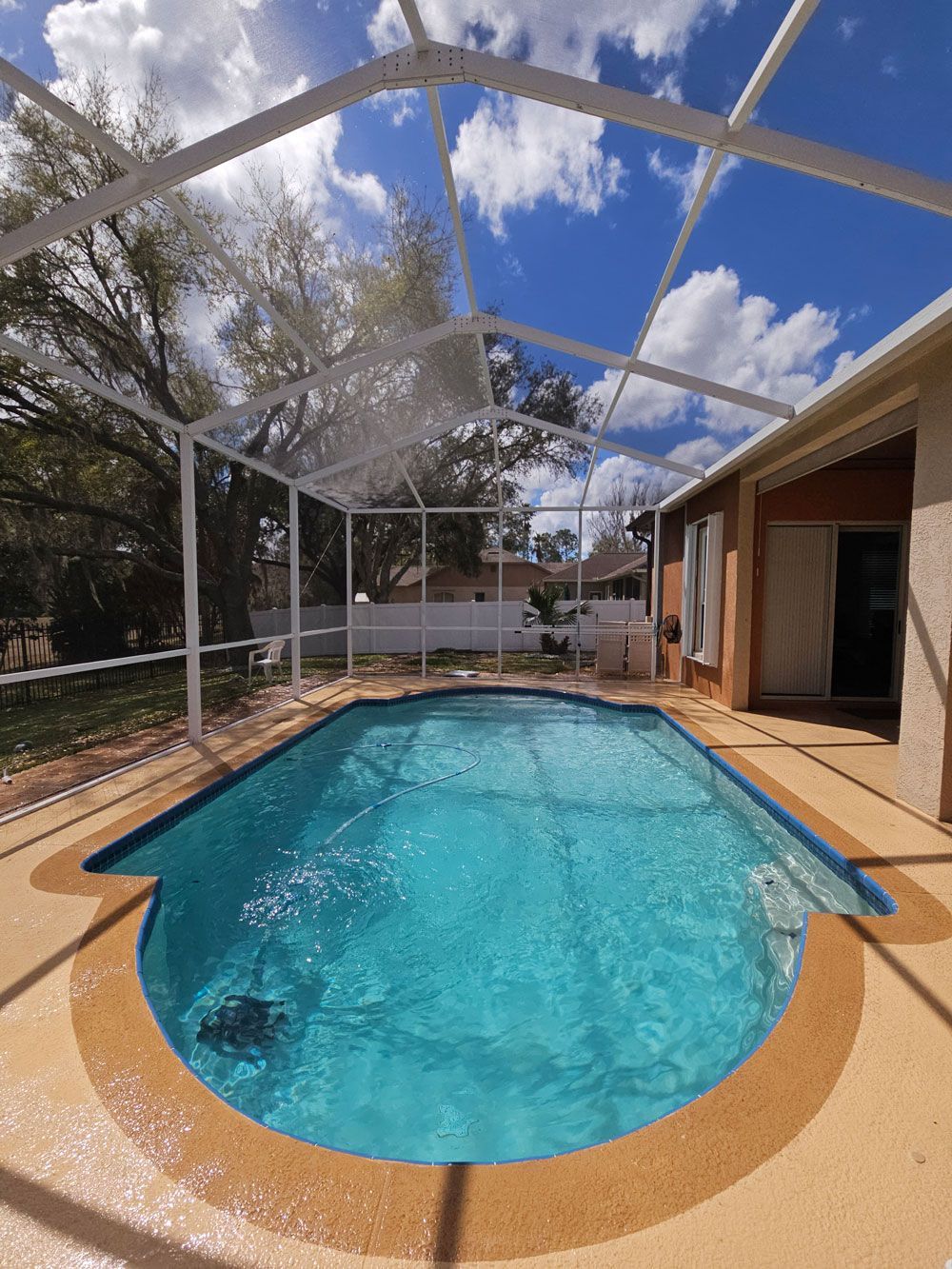 Clean white pool cage after professional cleaning in Valrico FL