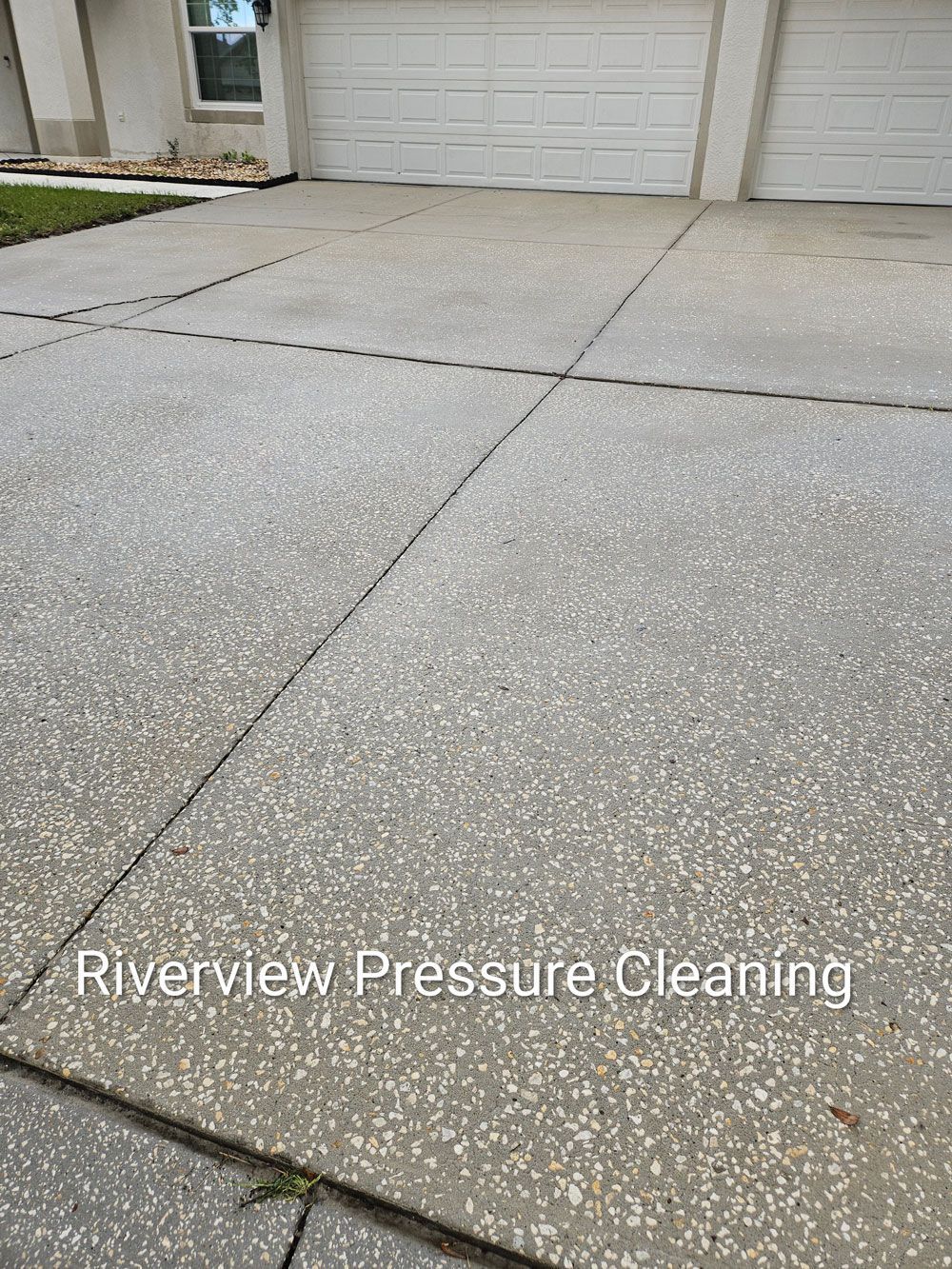 Clean driveway and sidewalks after pressure washing in Panther Trace Riverview FL