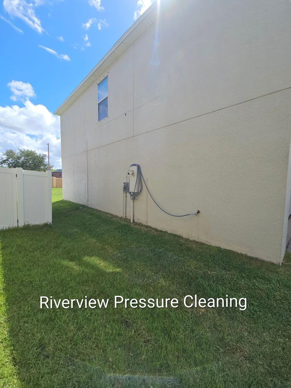 Clean house exterior after pressure washing in Ayersworth Wimauma