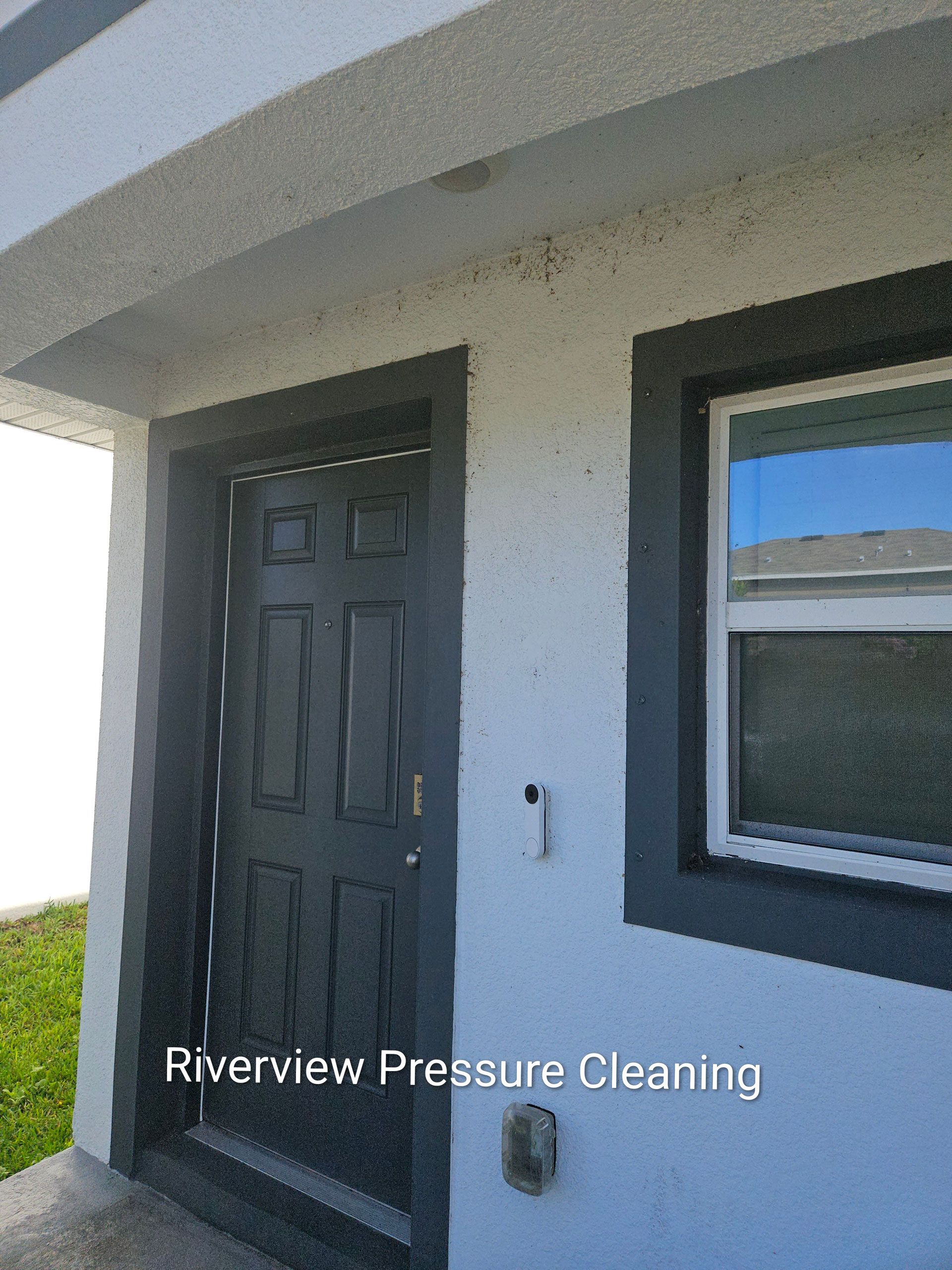 House exterior with dust and bug buildup in Berry Bay Wimauma