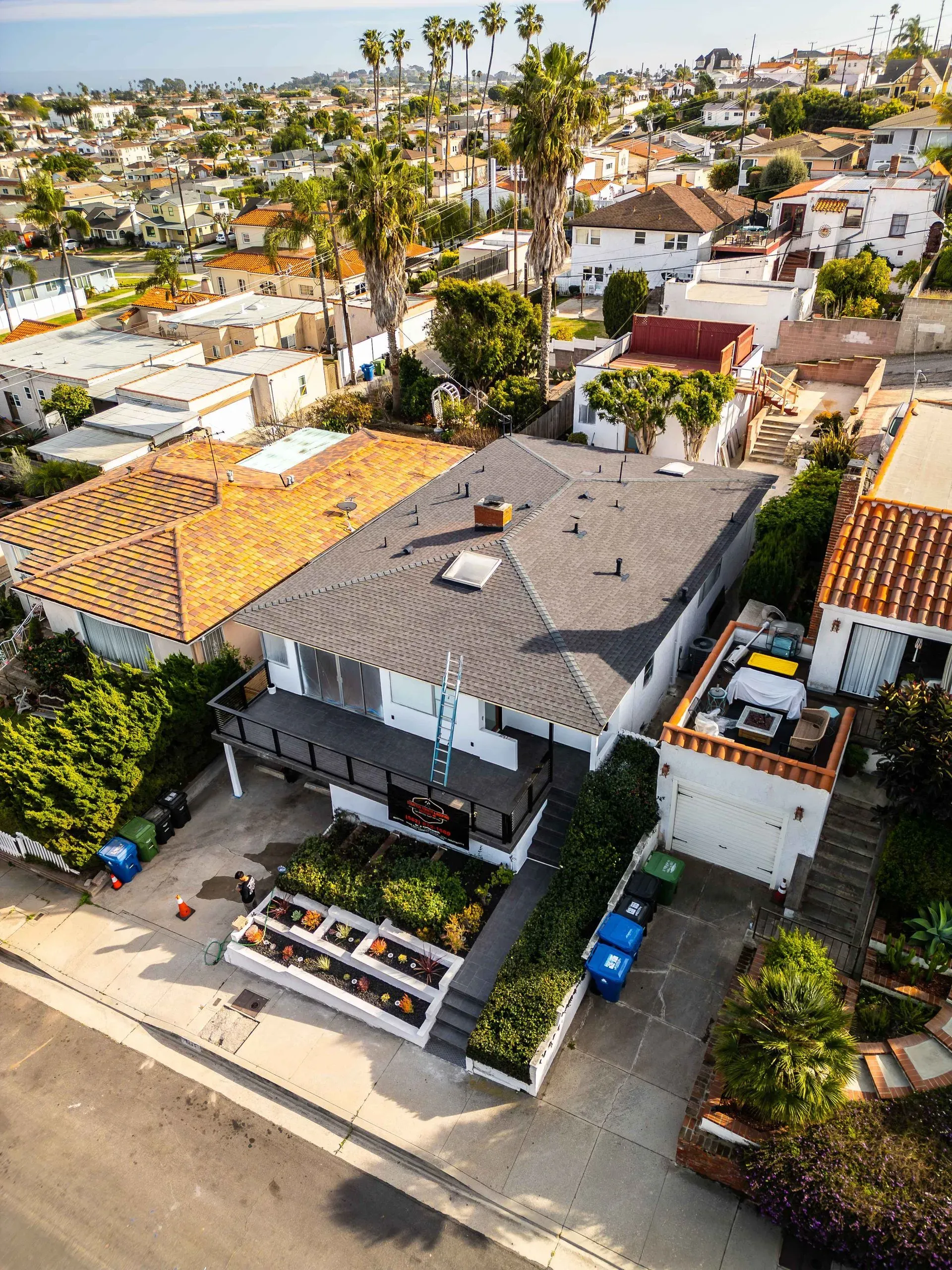 Aerial view of a residential roof inspection conducted by Stratton.