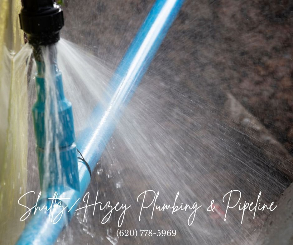 Leaking blue water pipe with water spraying. Text: Shutty & Higley Plumbing & Pipeline. Phone number visible.