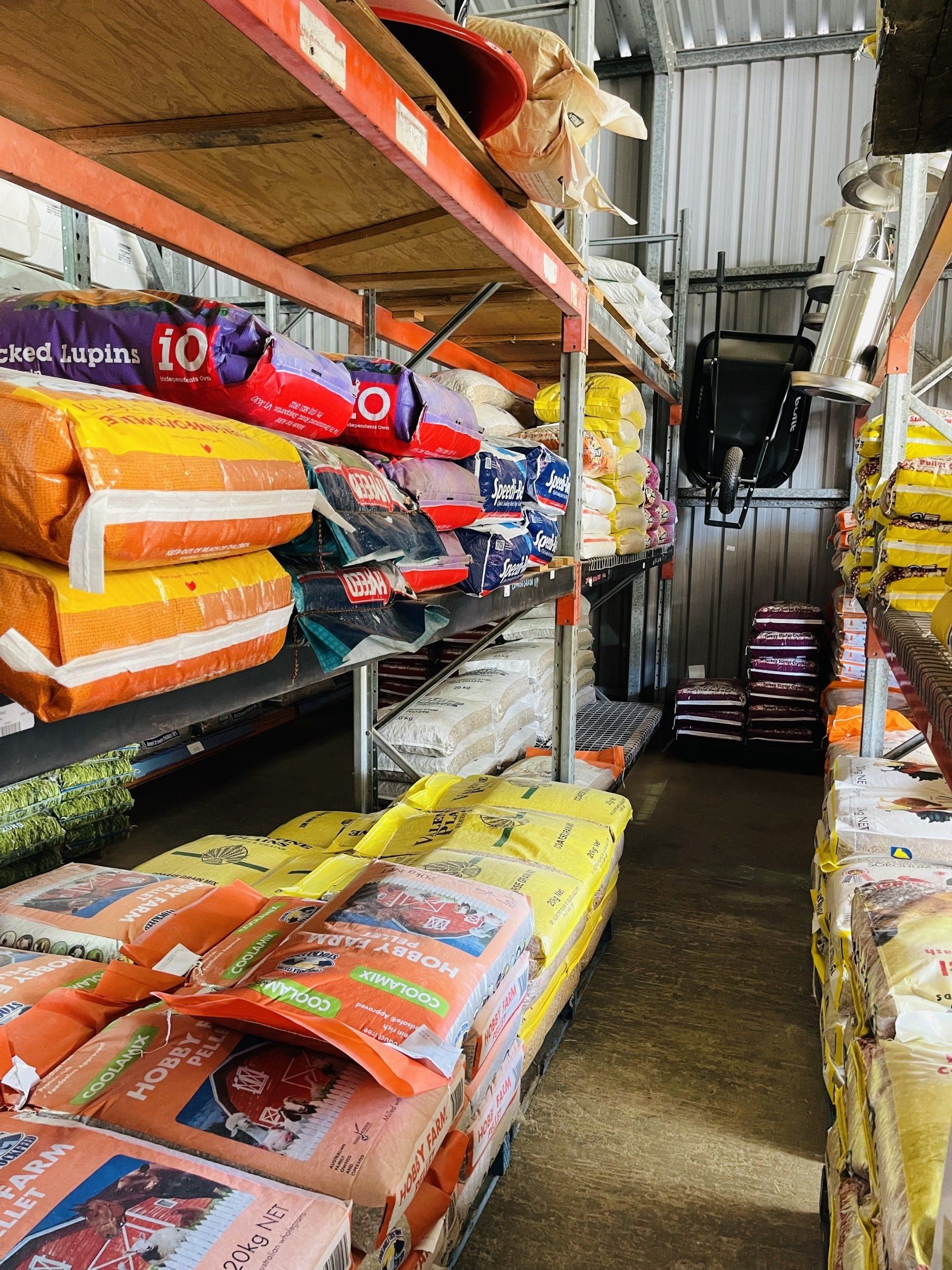 A warehouse filled with lots of bags of food.