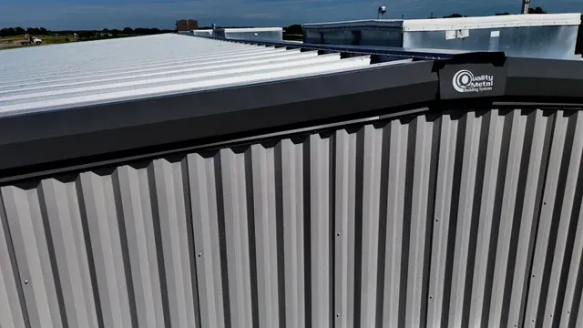 Metal building wall panels and trim detail on commercial steel structure
