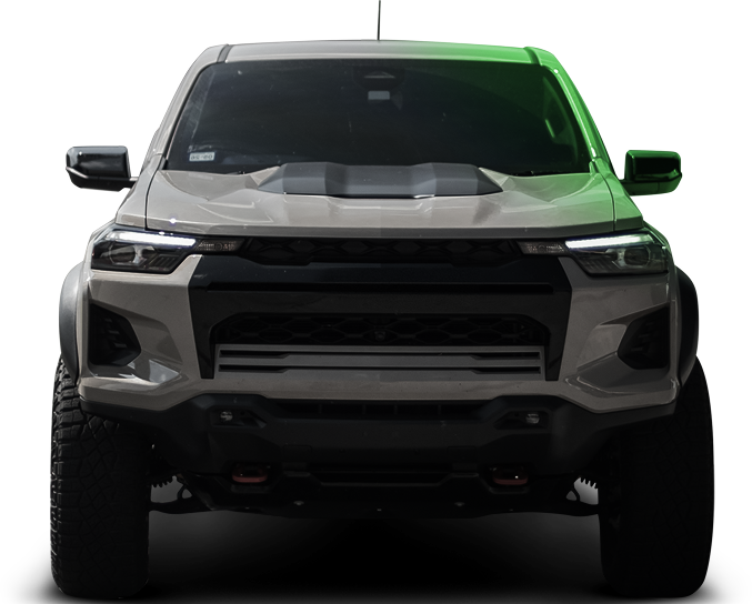 Front view of a black and green pickup truck on a white background | South Texas Diesel And Automotive