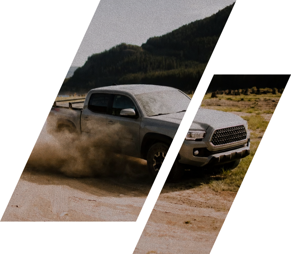 Yellow sports car in front of a muddy gray pickup truck on a rural road | South Texas Diesel And Automotive