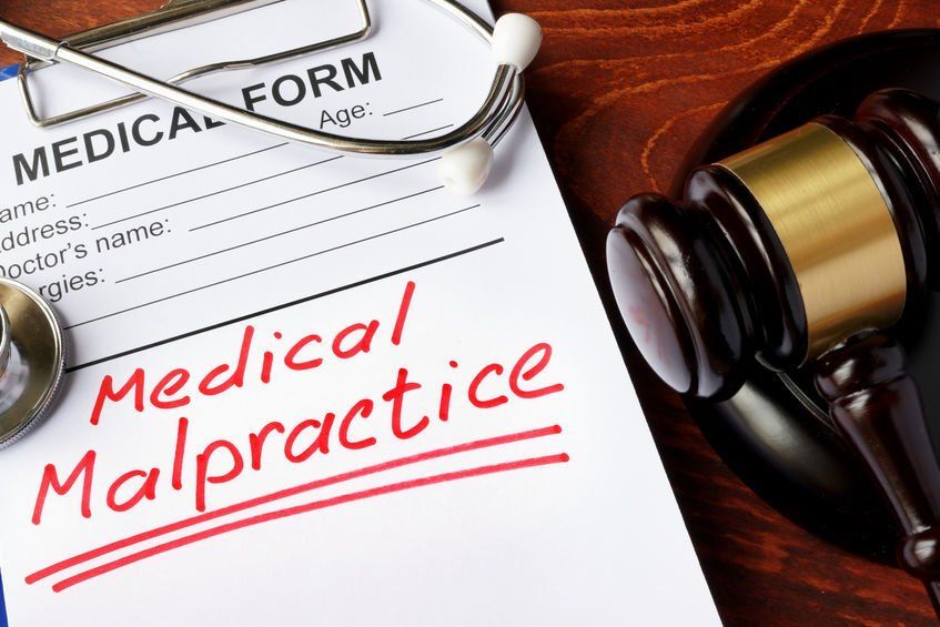 A medical form with the word medical malpractice written on it