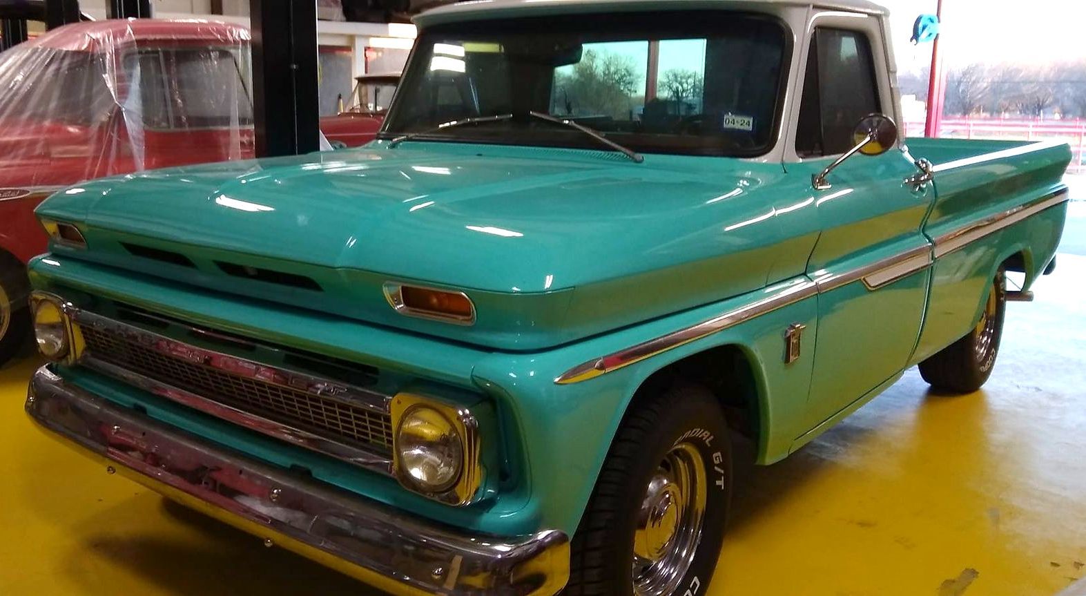 custom paint on teal truck 