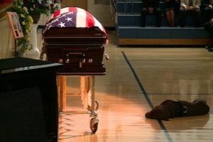 Veteran Funeral Services with dog in front of casket at Torres Cremation and Burial Services CA