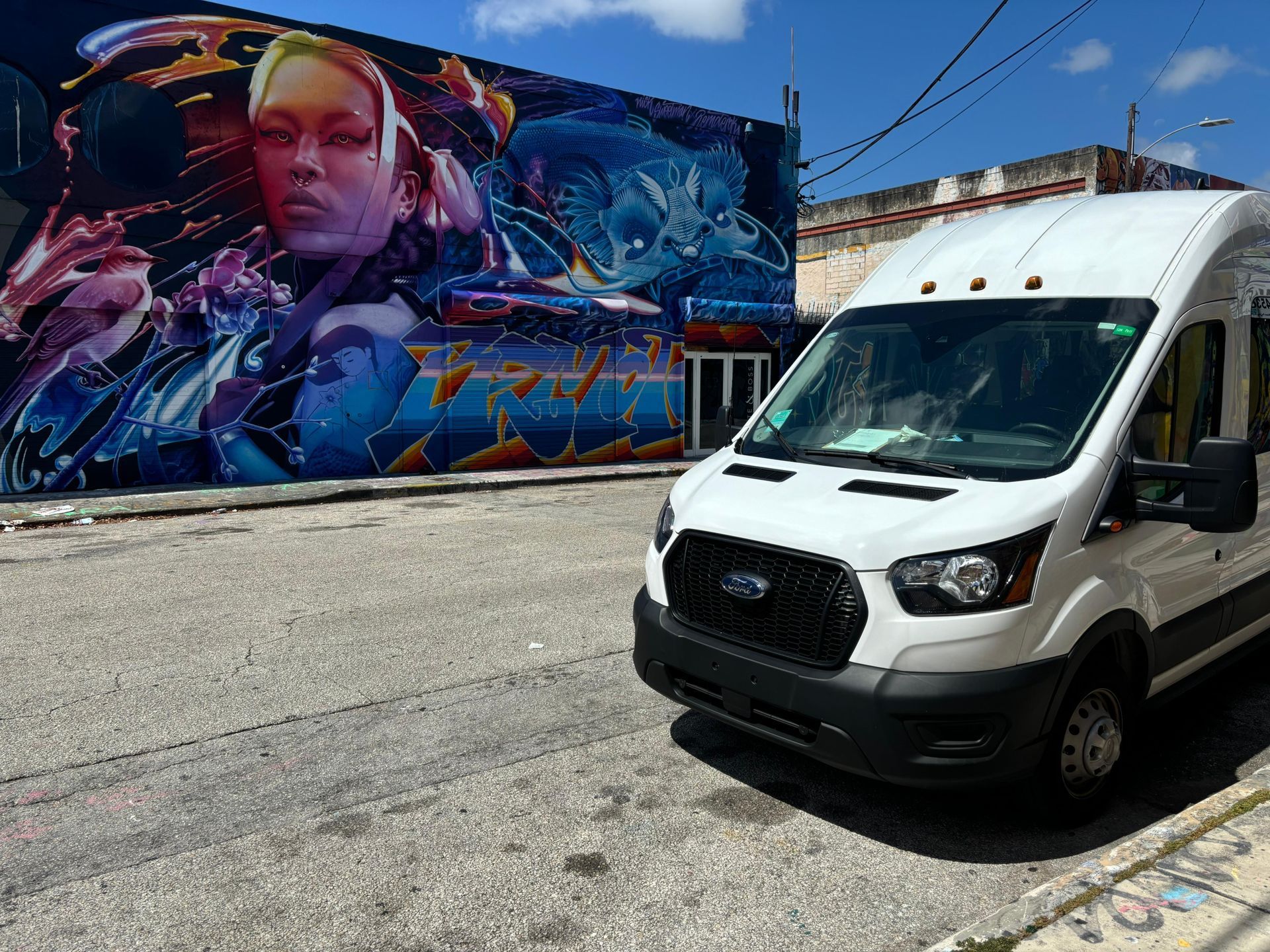 White Hop on hop off Miami bus waiting for passengers in Wynwood Walls