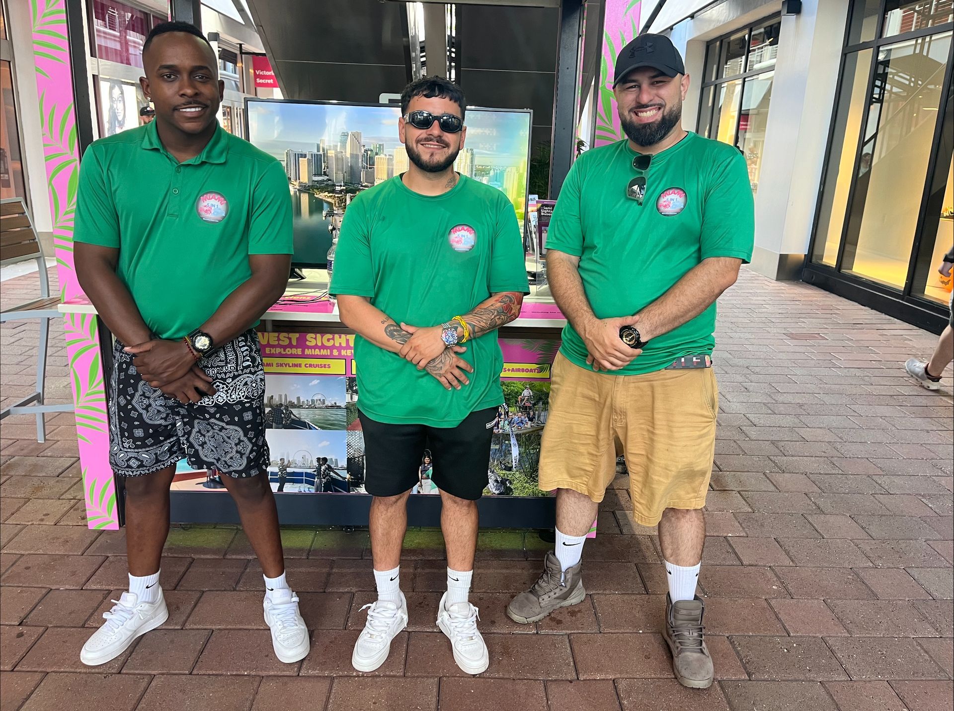 Miami Sightseeing Tours team in green uniforms in Bayside Marketplace