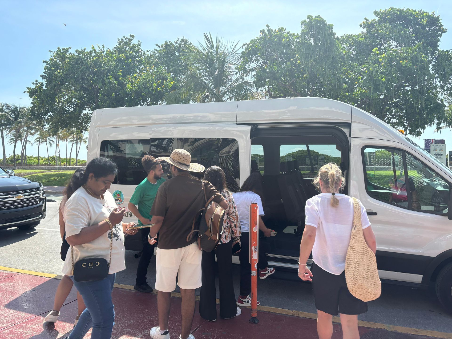 Guest hopping in the Miami City Tour in Ocean Drive 