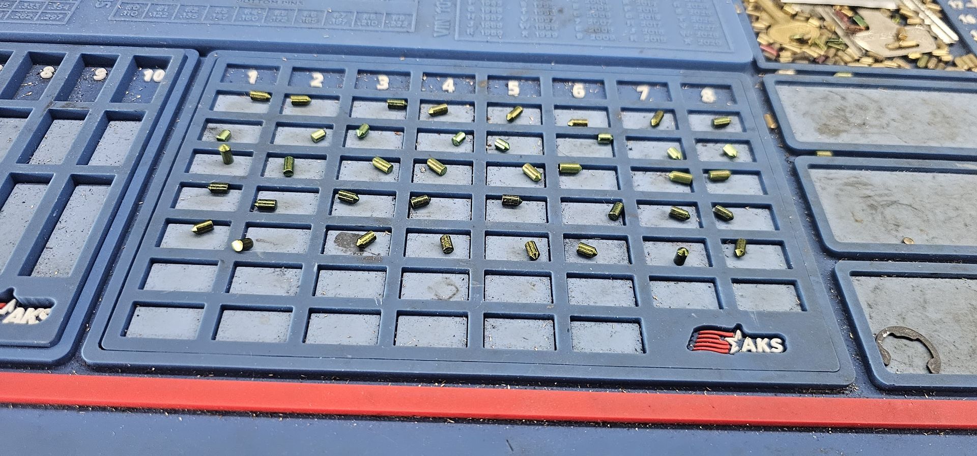 A blue tray with a red stripe on the bottom of it