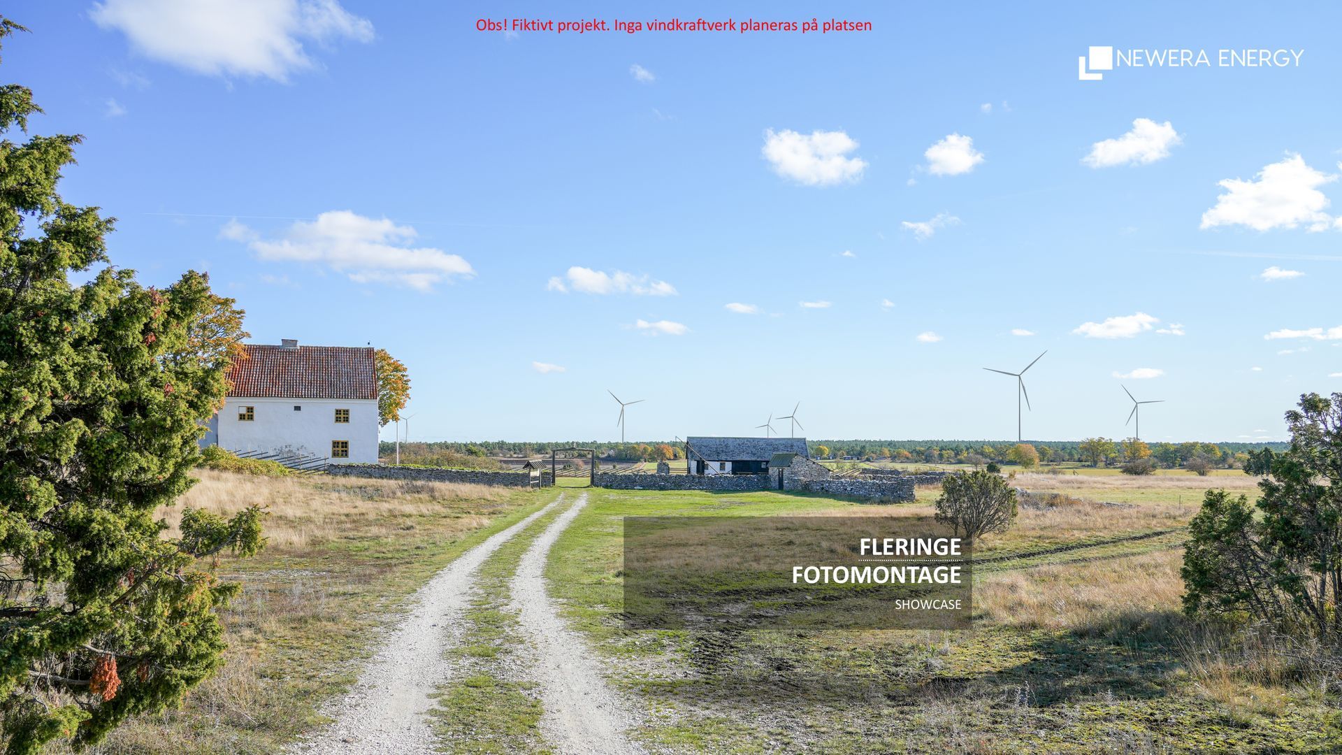 En grusväg leder förbi ett vitt hus och stenmurar mot vindkraftverk i ett lantligt, soligt landskap.