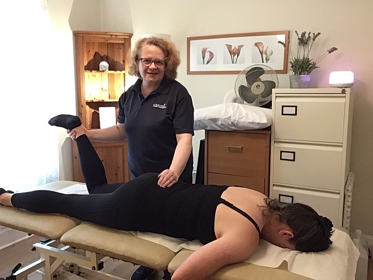 Treating back pain at In Touch with Health Osteopaths