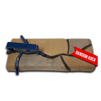 A piece of rock with a red label that says random rock