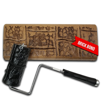 A brick bond roller is sitting next to a brick