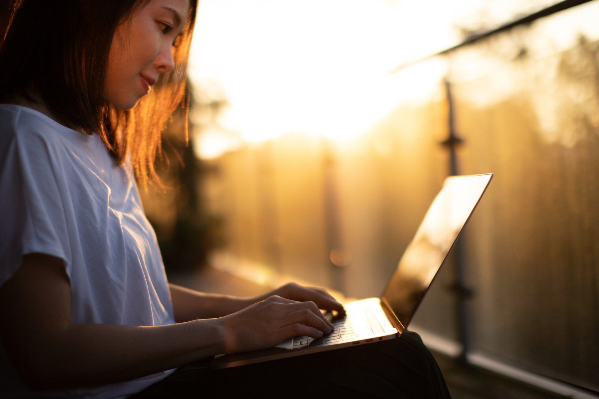 Woman Surfing the Web — Seguin, TX — Guadalupe Valley Family Violence Shelter, Inc.