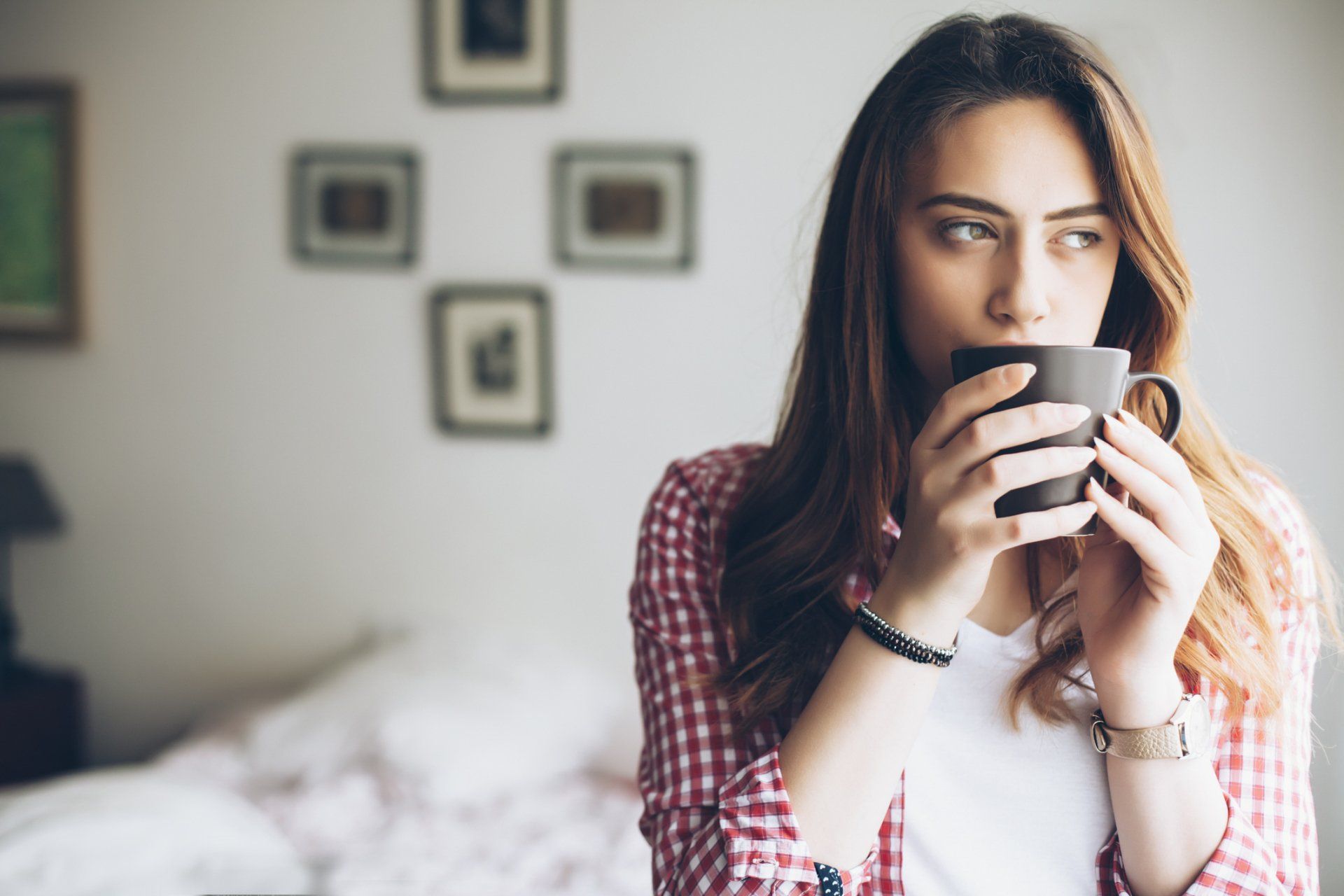 Woman Drinking Out of Cup — Seguin, TX — Guadalupe Valley Family Violence Shelter, Inc.