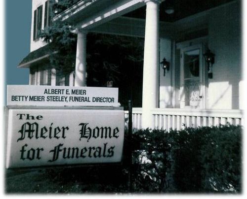 A sign for the meier home for funerals