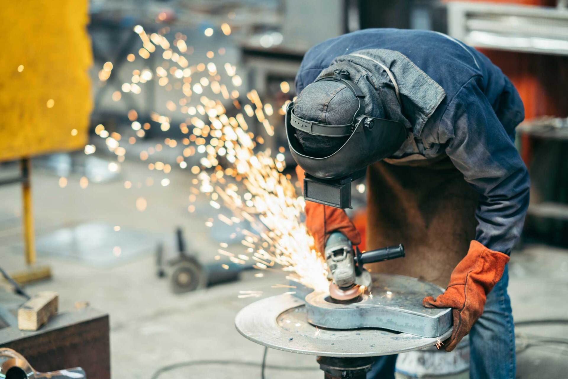 Worker Grinding Metal — Los Angeles, CA — LW Designs Worker Grinding Metal — Los Angeles, CA — LW Designs
