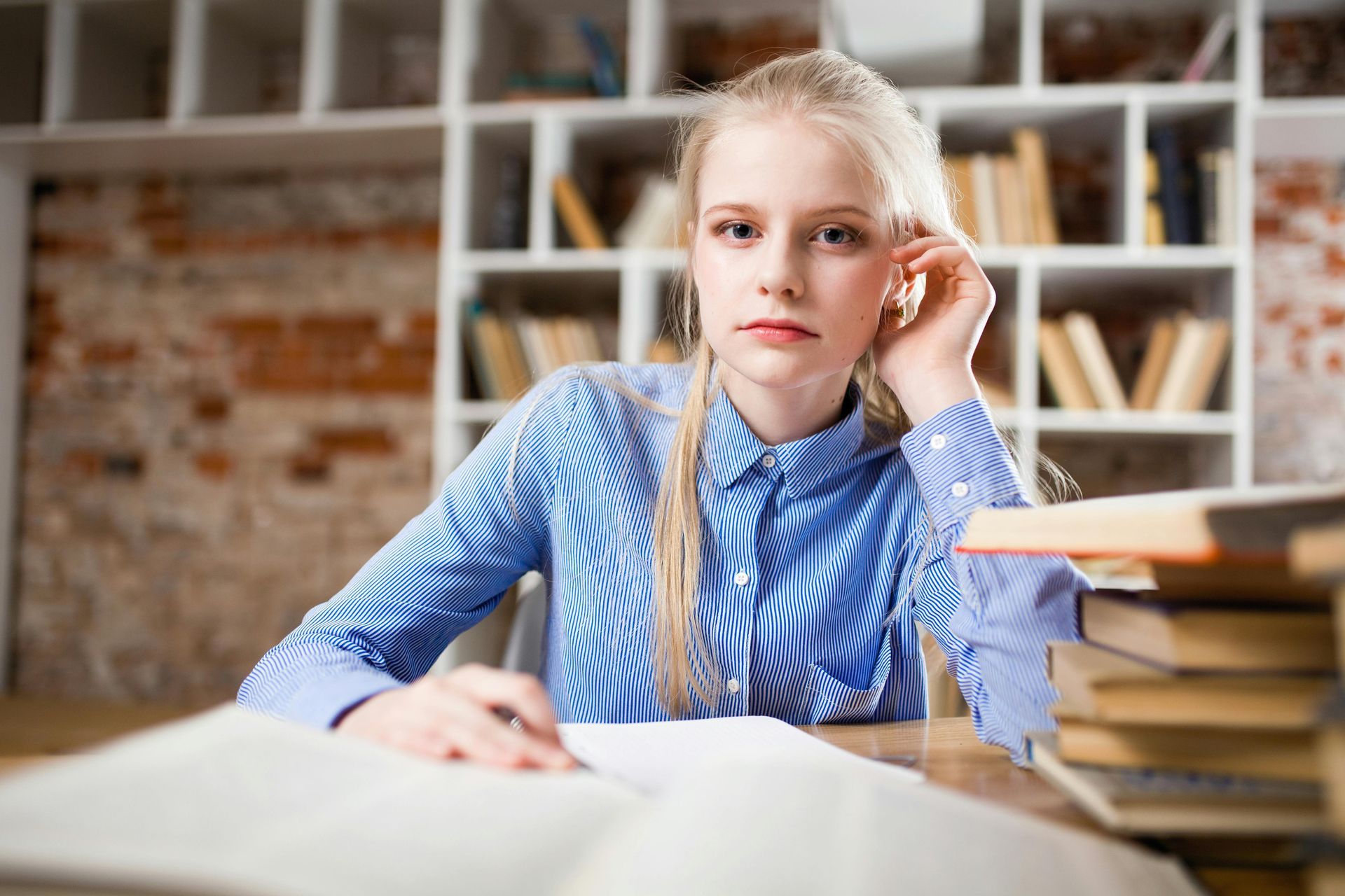 student looking forward in library 