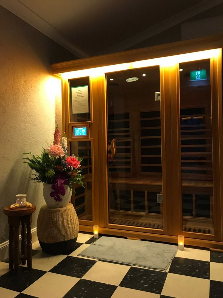 Flower Vase In Front Of Sauna — Thai Massage In Bathurst, NSW