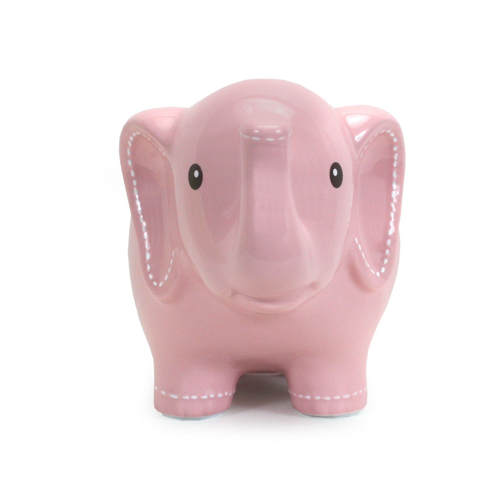 Pink ceramic elephant figurine with small black eyes on a white background