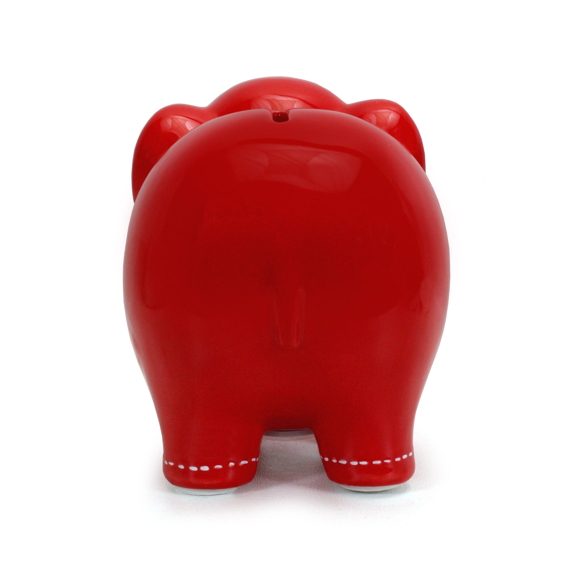 Red ceramic piggy bank on a white background