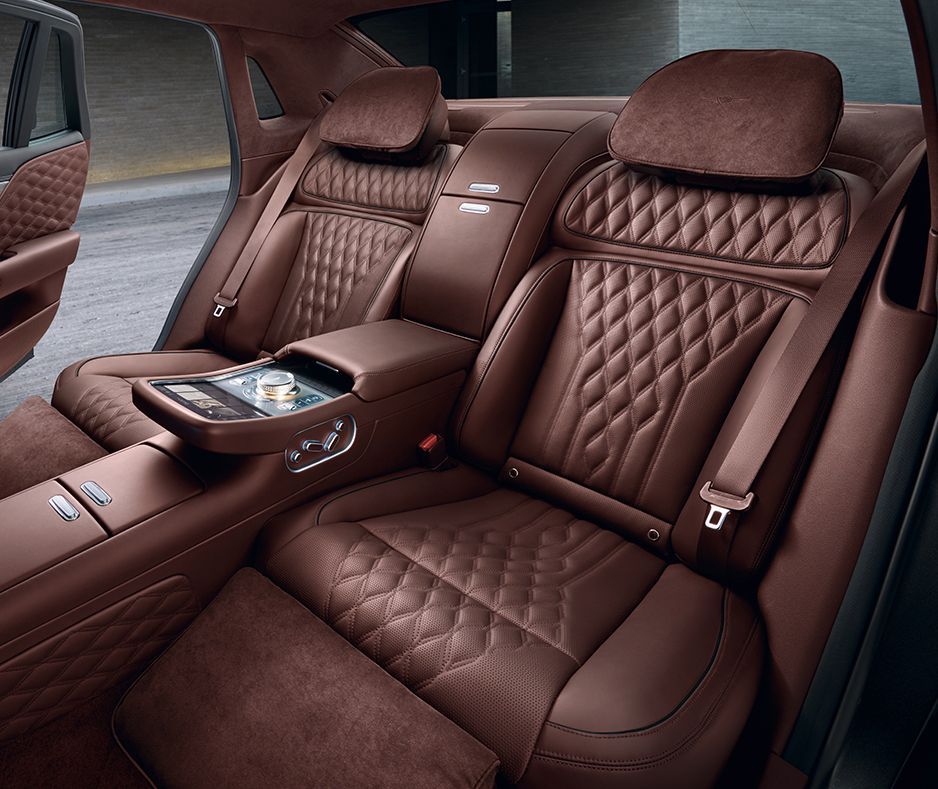 Brown quilted leather seats in a vehicle interior
