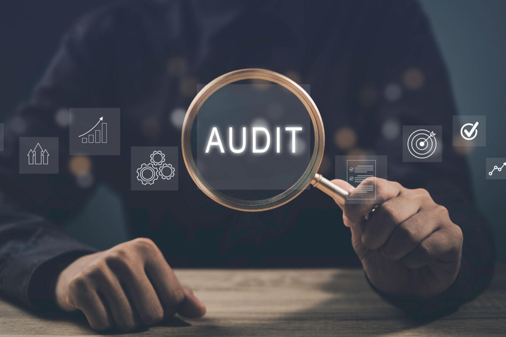 Business audit team reviewing financial documents and compliance reports in office