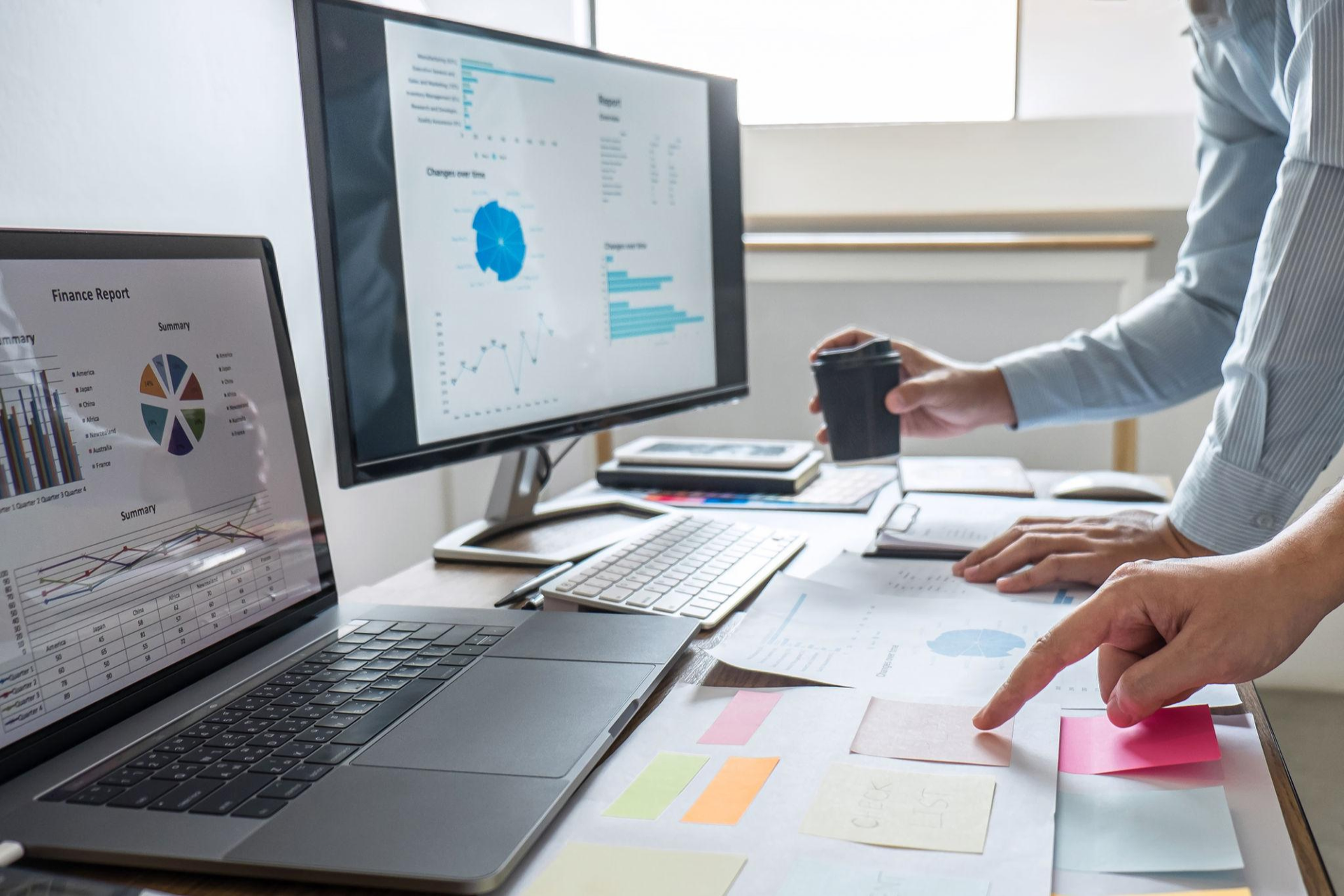 Business team analyzing financial charts and planning growth strategy in modern office