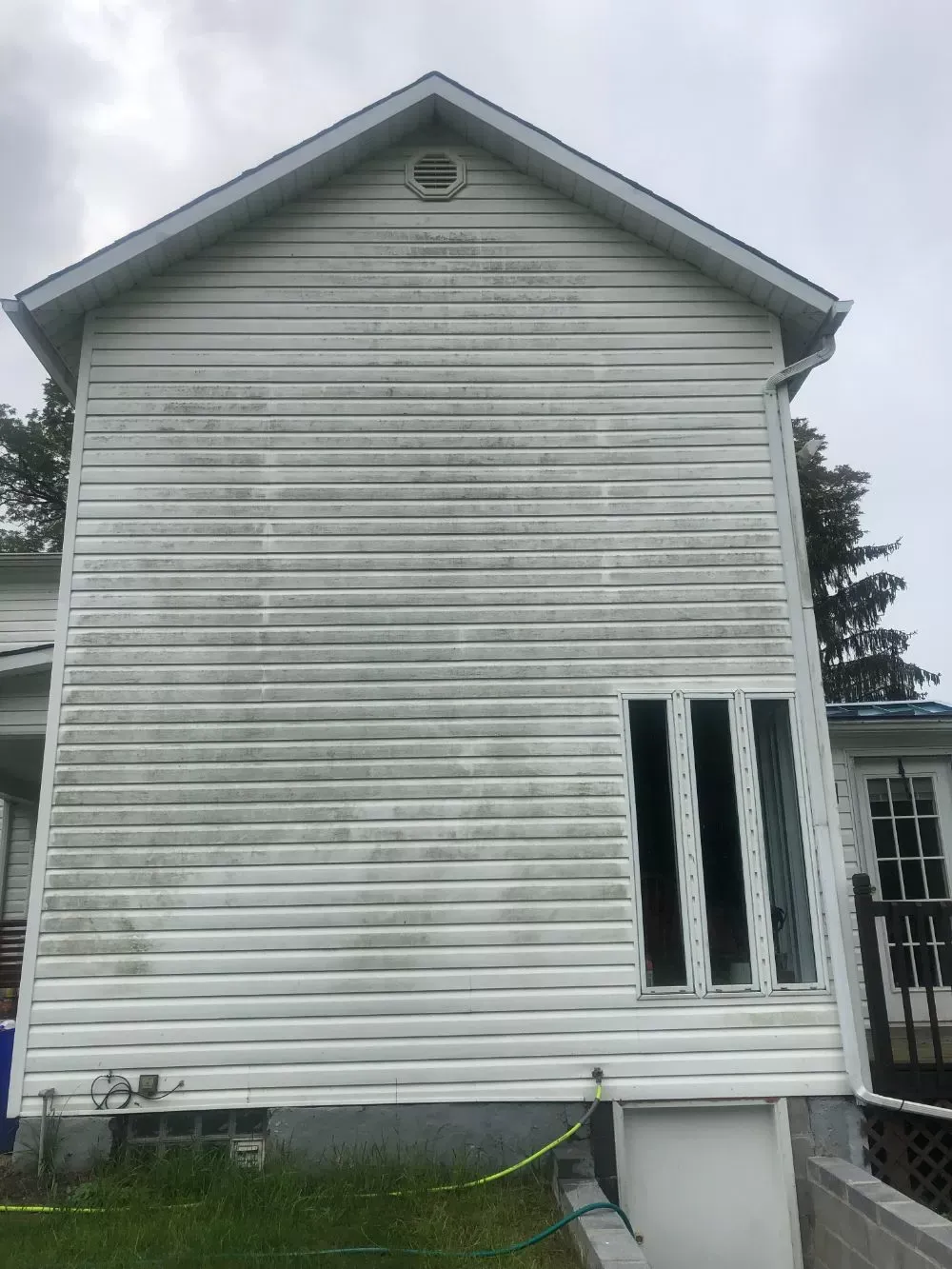 White House Wall Before Soft Wash — Homer City, PA — Awesome Exteriors Pressure Washing LLC