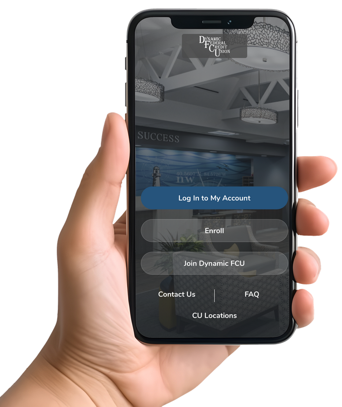 A hand holding a smartphone showing a login screen for